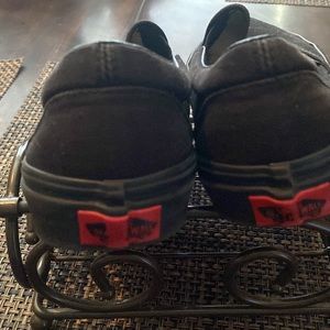 Vans black slip ons kids size 12.5